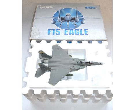 Armour Collection 1/48 scale diecast F-15E Strike Eagle, USAF. Model in overall very good though dusty condition, ventral fue