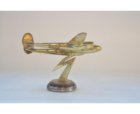 Vintage wartime era solid metal cast P-38 Lightning model on stylised lightning flash stand mounted onto rotatable bearing, s