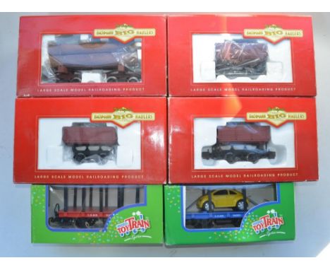 Six boxed G gauge goods wagons, 4 Bachmann to include three "L" ore side dump cars (item no 92502) and 1x"G" skeleton log car