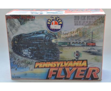 Boxed Lionel O gauge electric freight train "Pennsylvania Flyer". Model and track in near mint condition, box fair. Comes wit