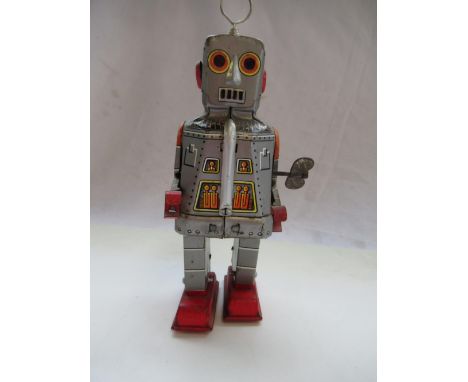 1960's Japanese tinplate clockwork Space Robot, H20cm, in non original later box 