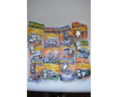 Extensive collection of Rally Car magazines with cased stackable diecast model rally cars from DeAgostini including sealed ma