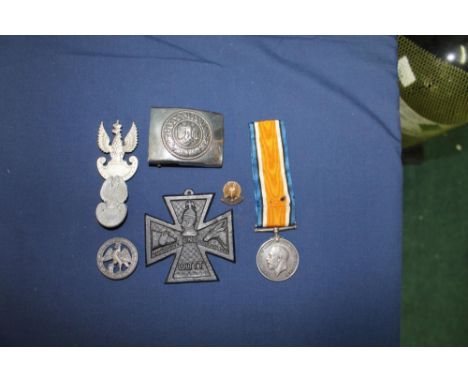 Collection of military badges and others including WWII German belt buckle, Imperial eagle cap badge, Boy Scouts beret badge,