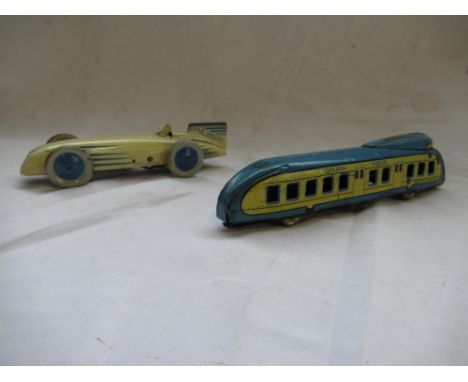 Chad Valley Harborne cream and blue tinplate clockwork Racing or Land Speed Record car, and a Wells tinplate clockwork Rail C