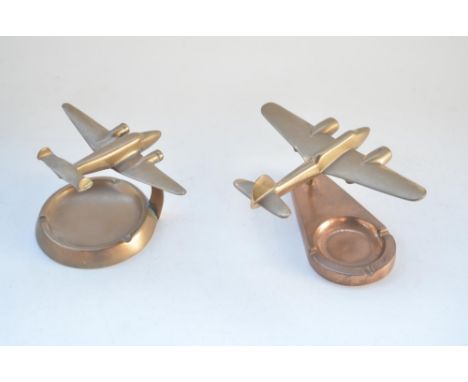 Pair of vintage wartime era solid cast metal model aircraft ashtrays, one Lockheed Hudson, the other resembling a Martin Balt