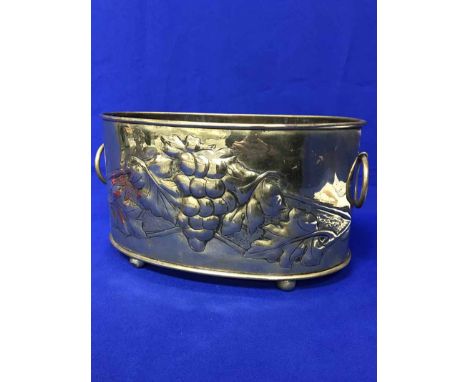 OVAL BRASS TWO HANDLED PLANTER WITH GRAPES AND VINE DECORATIONalong with three other brass ware planters and a kettle (5)