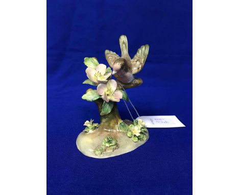 STAFFORDSHIRE FIGURE OF A ROBIN AND A ROYAL WORCESTER FIGURE OF 'APRIL'