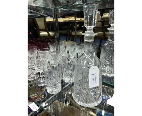 CRYSTAL DECANTER WITH GLASSESalong with eight early 20th century cranberry coloured glasses