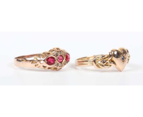 A late Victorian 9ct gold and sapphire single stone ring with a heart shaped motif between bead and scroll shoulders, Birming