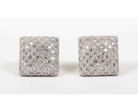 A pair of two colour gold and diamond earstuds, each in a square cushion shaped design, mounted with circular cut diamonds, d