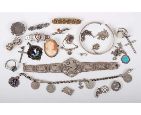 A group of mostly silver jewellery, comprising six brooches, two bracelets, a bangle, five necklaces and chains, an enamelled