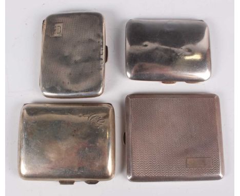 A George V silver engine turned rectangular cigarette case, London 1928, length 9cm, together with three other silver cigaret