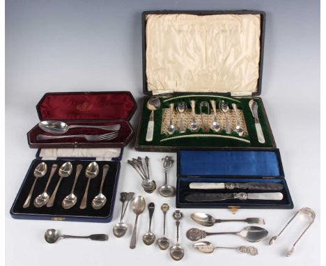 A small group of silver, including a pair of late Victorian sugar tongs, London 1899 by Goldsmiths &amp; Silversmiths Co Ltd,