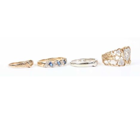 A 9ct gold, sapphire and diamond half eternity ring in a serpentine design, Birmingham 1993, ring size approx P, a 9ct white 