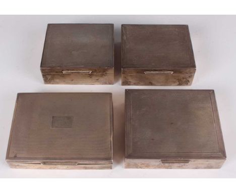 A pair of Elizabeth II silver square cigarette boxes, London 1964 by S.J. Rose &amp; Son, width 9cm, a silver rectangular cig