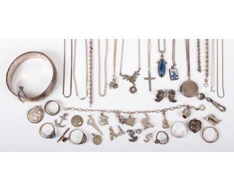 A small group of mostly silver jewellery, including an oval hinged bangle, Birmingham 1959, weight 30.6g, inside width 6cm, s