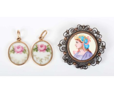 A Limoges style circular brooch, the centre mounted with an enamelled portrait of a classical lady, unmarked, diameter 3.7cm,