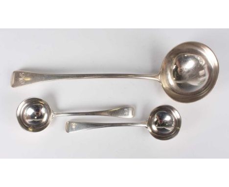 A pair of George V silver Old English pattern sauce ladle, London 1914 and 1917, and a matching silver soup ladle, London 191