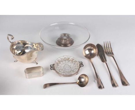 A George III silver Hanoverian Rat Tail pattern sauce ladle, London 1800 by Thomas Wallis II, length 13cm, and a small group 