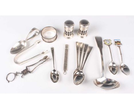 A pair of George V silver cylindrical pepper casters with pierced sides, Birmingham 1924 by Docker &amp; Burn Ltd, height 5.2