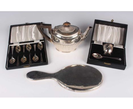 A George V silver half-reeded bachelor's teapot, Sheffield 1910 by James Dixon &amp; Sons Ltd, height 13.5cm, a silver christ