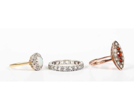 A 9ct gold, garnet and half-pearl marquise shaped cluster ring, weight 1.6g, ring size approx K (one half-pearl lacking), an 