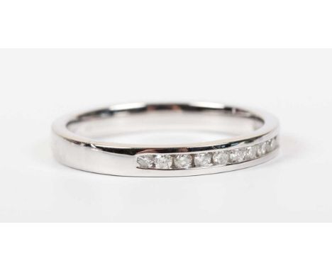 A 9ct white gold and diamond half eternity ring, mounted with a row of circular cut diamonds, London 2012, weight 2g, ring si