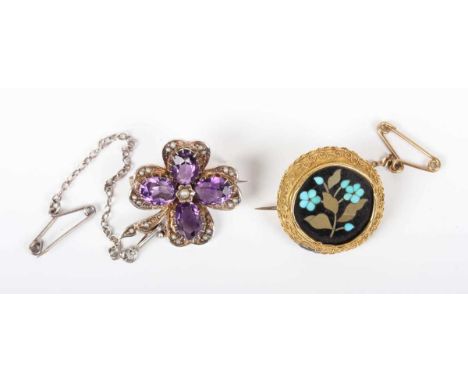 A pietre dure circular brooch, decorated with a forget-me-not flower spray, width 2.1cm, and a silver, amethyst and seed pear