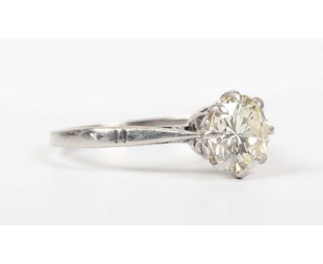 A platinum and diamond single stone ring, claw set with a circular cut diamond, weight 3.3g, diamond weight approx 1.55ct, ri