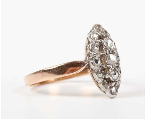 A gold and diamond marquise shaped cluster ring, probably French, mounted with rose cut diamonds, marks to exterior of shank,