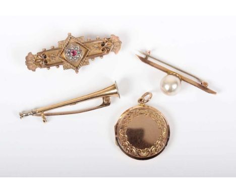 An Edwardian 9ct gold, ruby and seed pearl brooch with applied bead and ropetwist wirework decoration, Chester 1908, width 4.