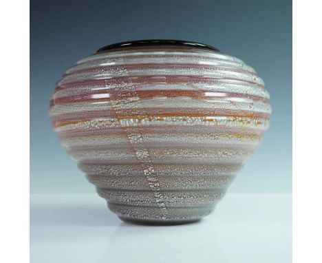 Striking art glass vase by Seguso Vetri d'Arte, Murano, Italy. This handcrafted piece features a wide-bodied form with a narr