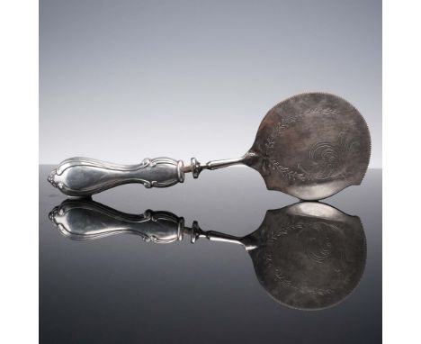 This elegant cake or pastry server features a sterling silver handle marked Sterling and a scalloped silver-plated or stainle