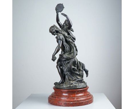 Patinated bronze sculpture titled Bacchantes, cast after the original by Claude Michel, known as Clodion. This exuberant Neoc