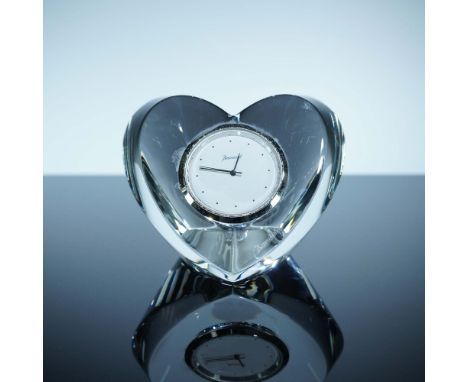 Elegant Baccarat crystal heart-shaped table clock, featuring a minimalist white dial encased in a precision-cut clear crystal