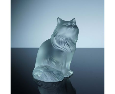 This frosted crystal cat figurine by Lalique portrays a long-haired feline seated upright, its elegant posture and detailed f