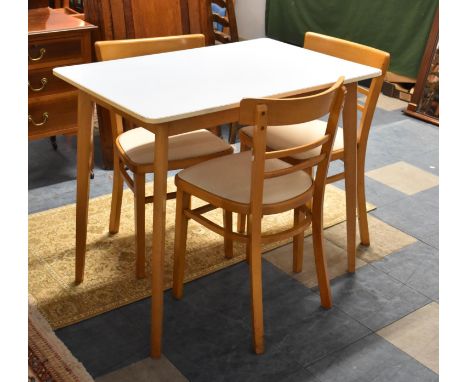 A Mid 20th Century Formica Topped Kitchen Dining Table and Three Ladder Back chairs 