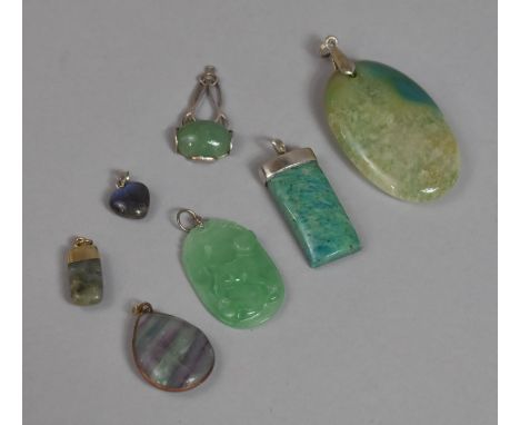 A Collection of Semiprecious Stone Pendants to include Labradorite Heart, Carved Jade Pendants Etc 