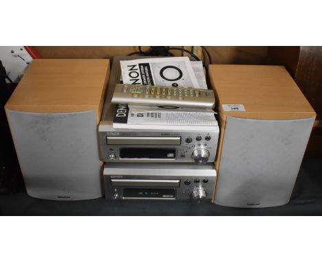 A Denon Stereo Cassette Player, CD Receiver and Speaker with remote and Instruction 