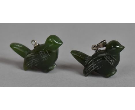 A Pair of Jade Pendants, Mounted in Silver, in the Form of Sparrows. 