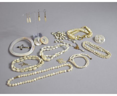 A Collection of Vintage Mother of Pearl Items to include  Necklaces, Clip on Earrings, Brooches Etc 