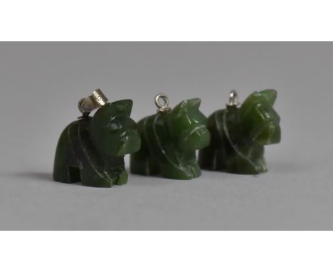 A Collection of Three Jade Pendants, Mounted with Silver, Carved in the Form of French Bulldogs. 1.8cms Tall 