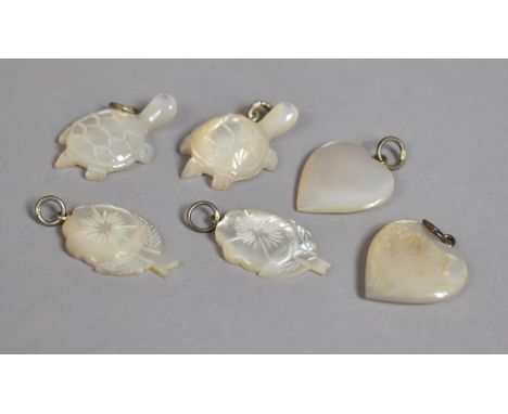 A Collection of Carved Mother of Pearl Pendants in the Form of Heaths, Turtles, Flowers Etc 
