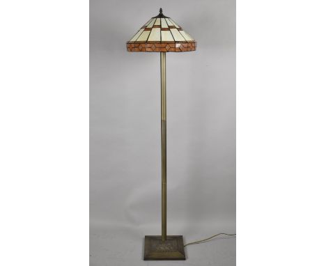 A Modern Brass Standard Lamp with Tiffany Style Shade 