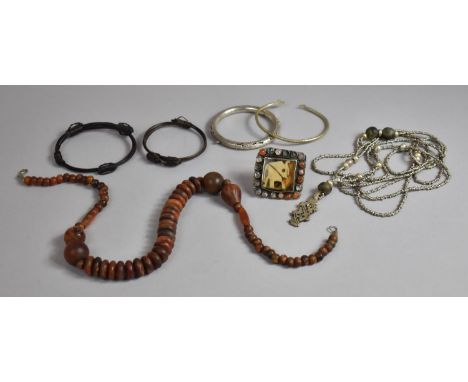 A Collection of Vintage Ethnic Jewellery to include White Metal Serpent Head Bangle, Hinged White Metal Bangle, Horn Necklace