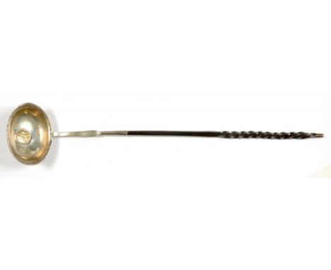 A SILVER AND TWISTED BALEEN HANDLED TODDY LADLE, 37 CM L, INSET WITH A PORTUGUESE ½ ESCUDO 1778 GOLD COIN++TARNISHED