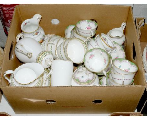 A CHELSEA CHINA GREEN BORDERED TEA SERVICE, DECORATED WITH ROSES, PRINTED MARK AND THAT OF THE RETAILED HARRODS LIMITED, A PL