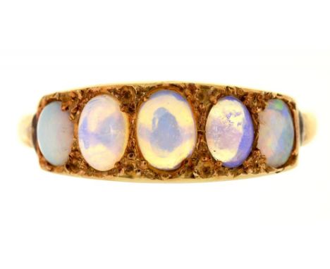 A FIVE STONE OPAL RING, IN GOLD MARKED 18CT, 2.5G, SIZE N½ AND A BROWN STAR SAPPHIRE RING, IN 9CT GOLD, 2G, SIZE N++MIDDLE OP