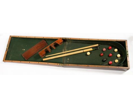 A VICTORIAN MAHOGANY FOLDING BAGATELLE SET