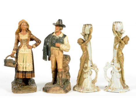 A PAIR OF ERNST WAHLISS JUGENDSTIL LIGHT BLUE IRIDESCENT AND BRONZED FIGURAL CANDLESTICKS, 30CM H, IMPRESSED AND PRINTED MARK